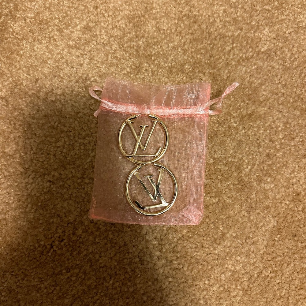 Brand new Gold earrings